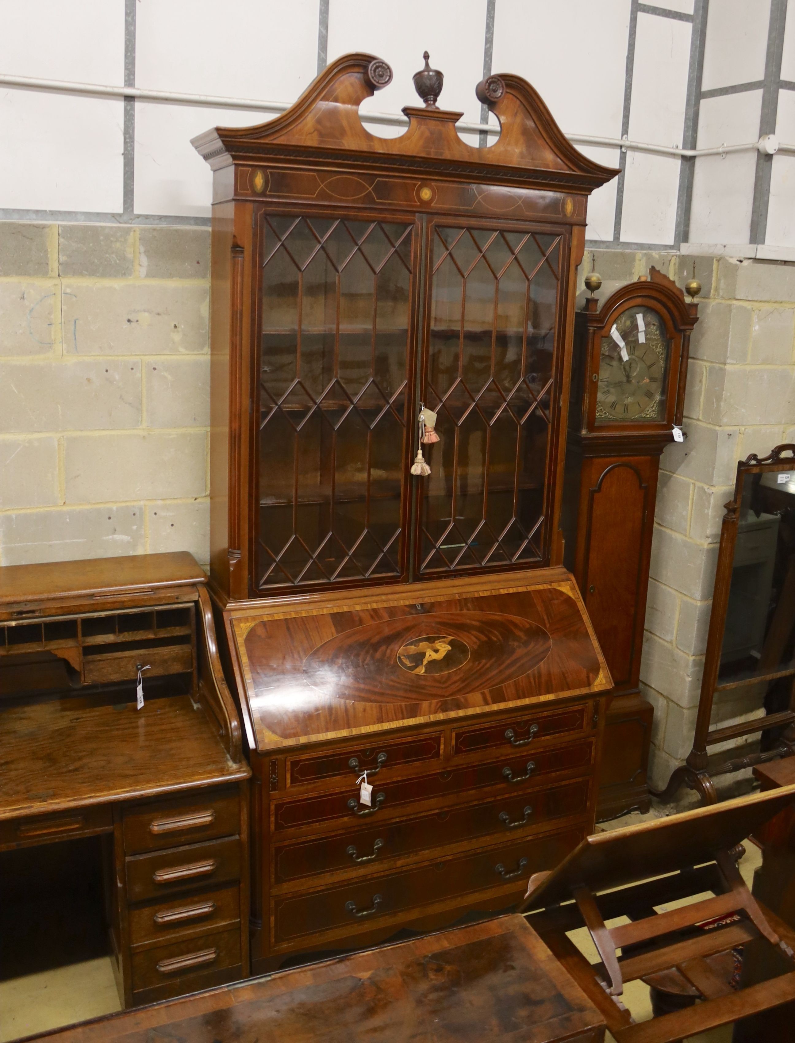 A George III style inlaid mahogany bureau bookcase, length 132cm, depth 57cm, height 276cm